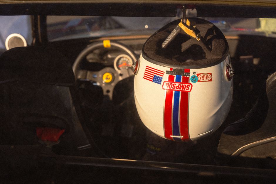 A racing helmet and safety gear